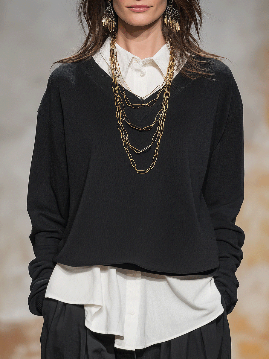 Stylish And Minimalist Black Shirt Layered Over A White Shirt