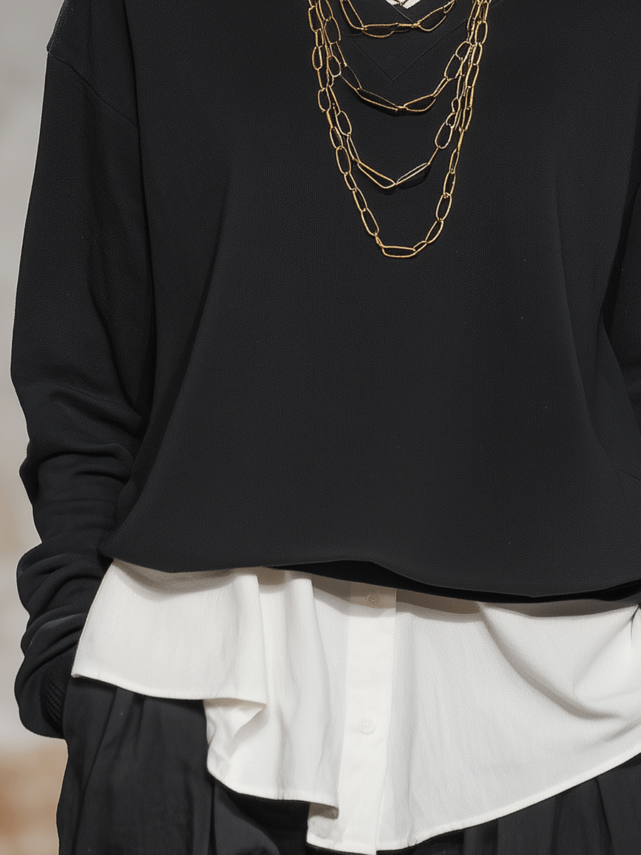 Stylish And Minimalist Black Shirt Layered Over A White Shirt