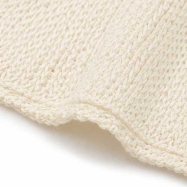 Solvera – Open Knit Batwing Top with Asymmetric Hem
