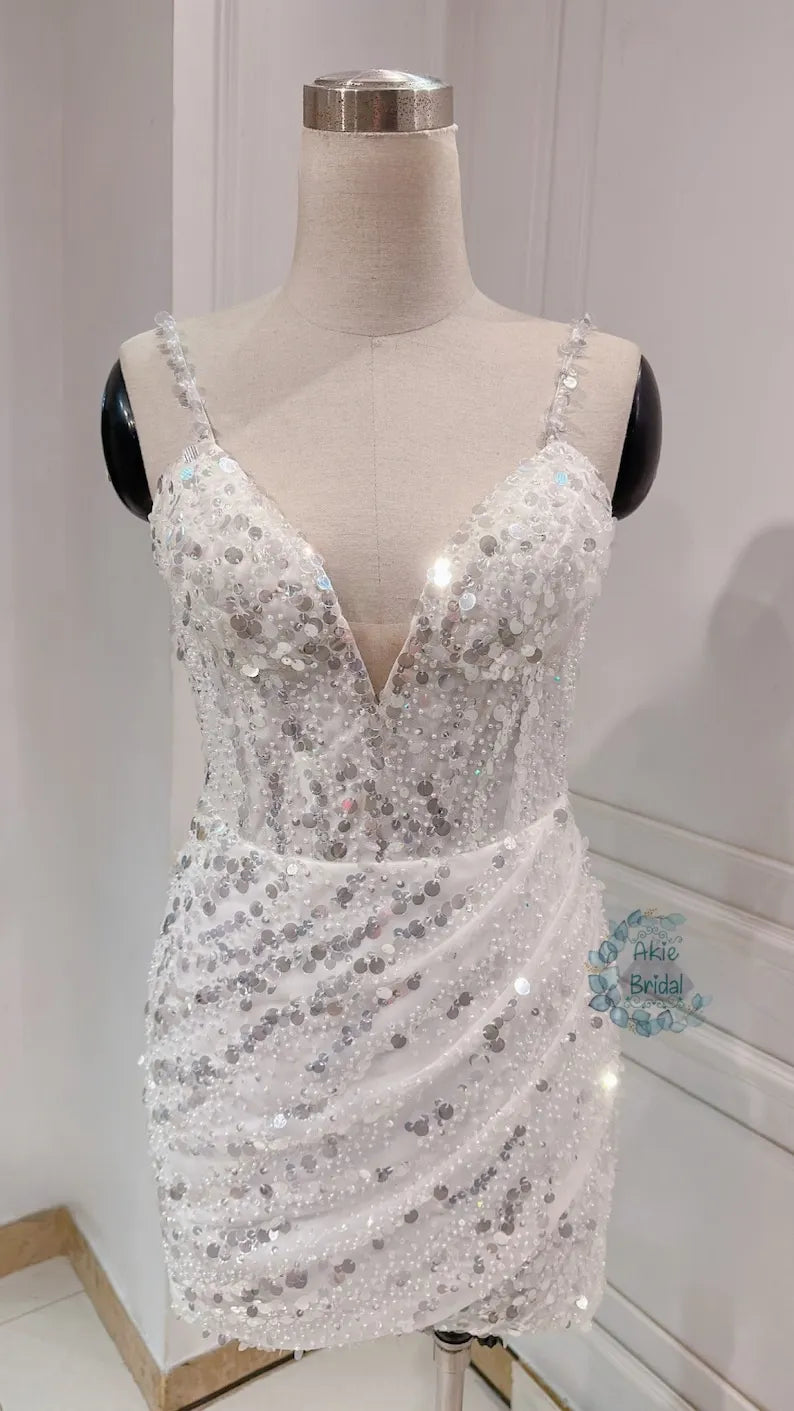 Custom wedding dress for the bride. Sexy V-deep short wedding dress. Beaded mini wedding dress with spaghetti sleeves for the party.