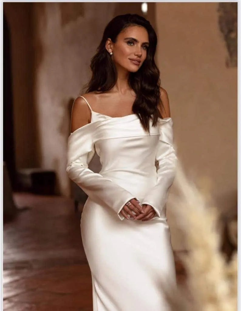 Satin wedding dress and off-shoulder neckline help you create Highlights, Sleeves help hide your flaws.