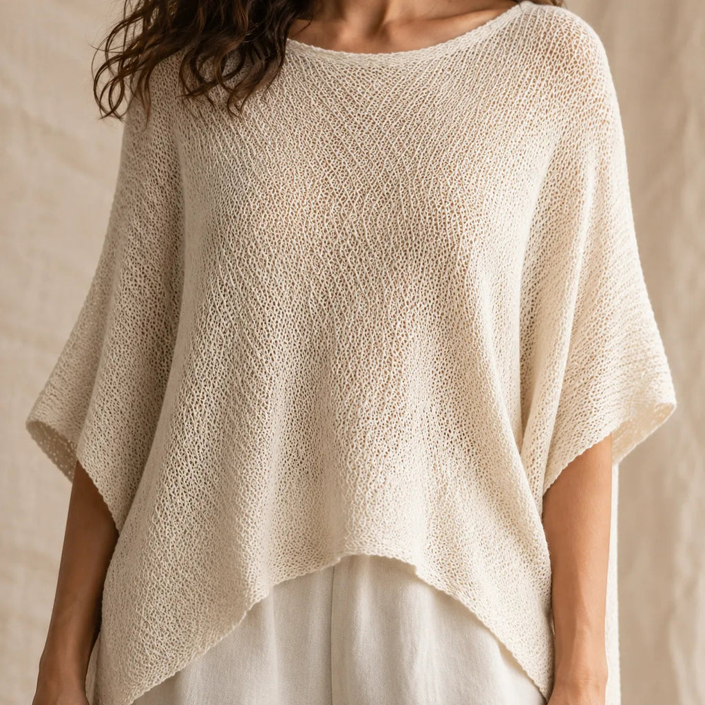 Solvera – Open Knit Batwing Top with Asymmetric Hem