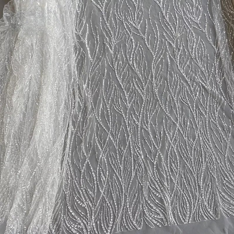 Custom short wedding dress for bride. Luxury long-sleeve beaded short wedding dress. Sexy deep V-neck short wedding dress.