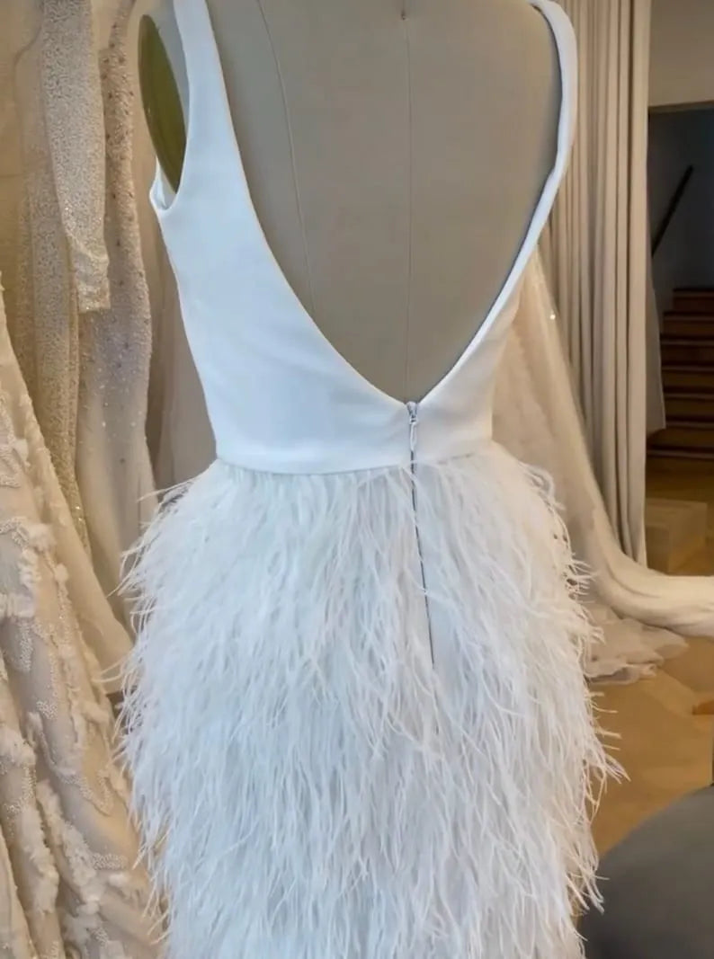 Custom short wedding dress for the bride.