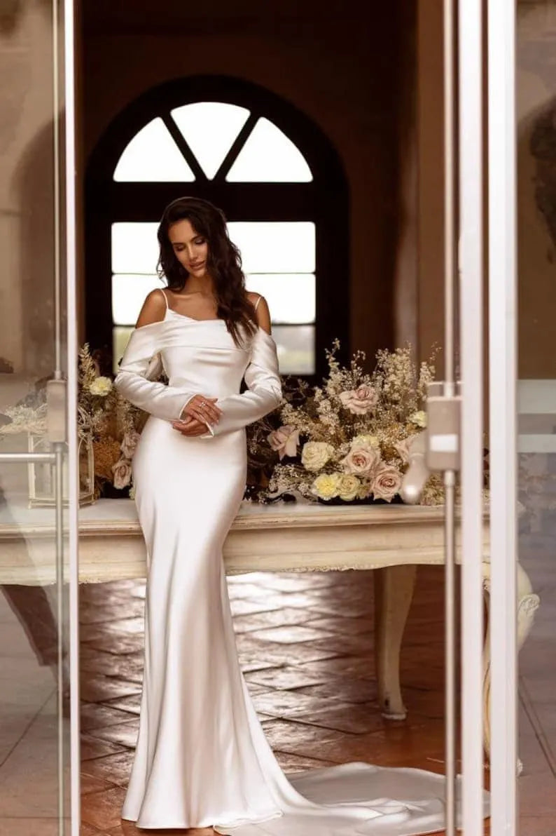 Satin wedding dress and off-shoulder neckline help you create Highlights, Sleeves help hide your flaws.