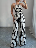 Loose Sleeveless Contrast Color Pleated Spaghetti-Neck Jumpsuits