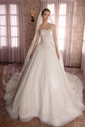 Strapless bridal gown featuring pearl and crystals