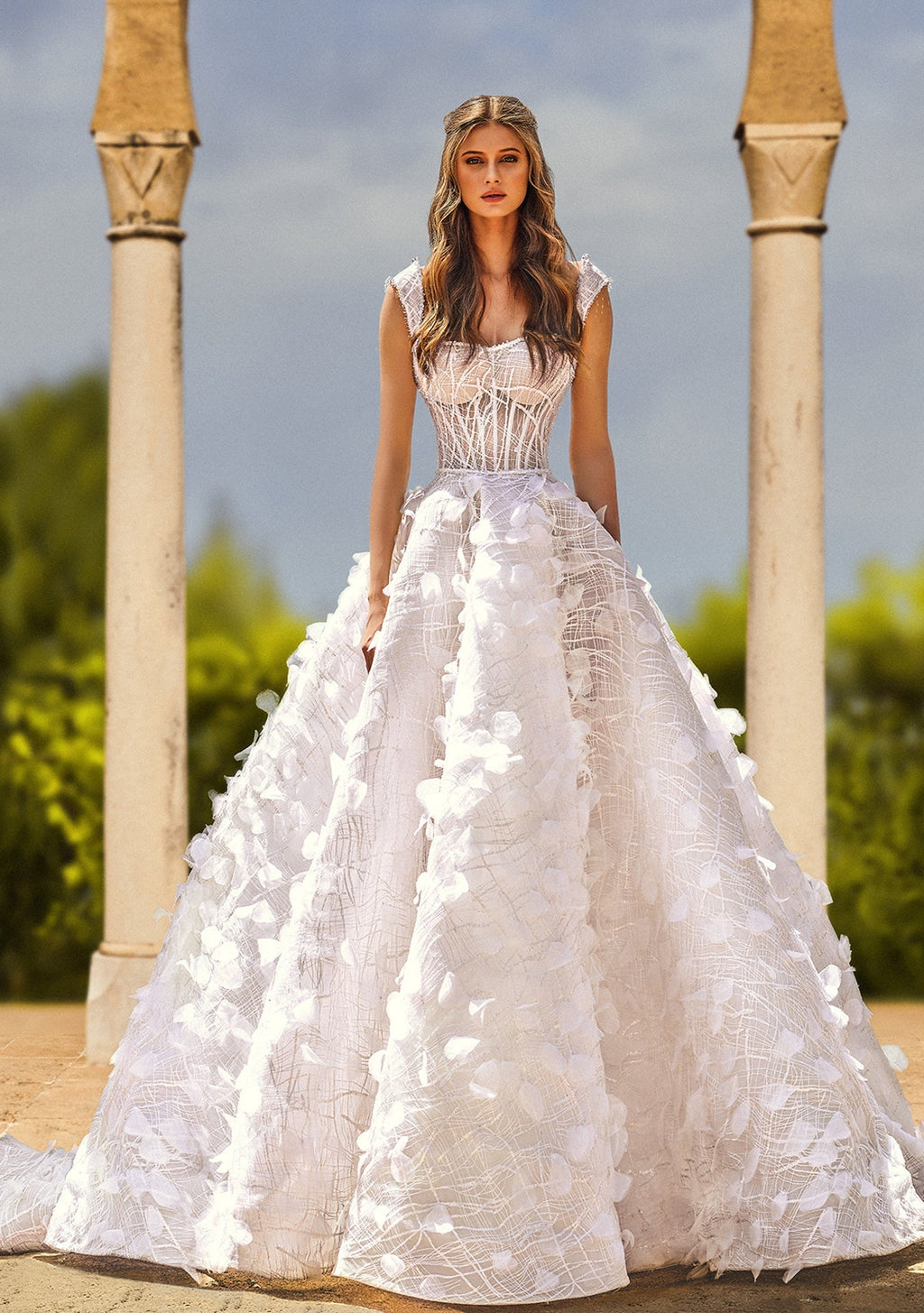Sleeveless wedding dress with organza petals