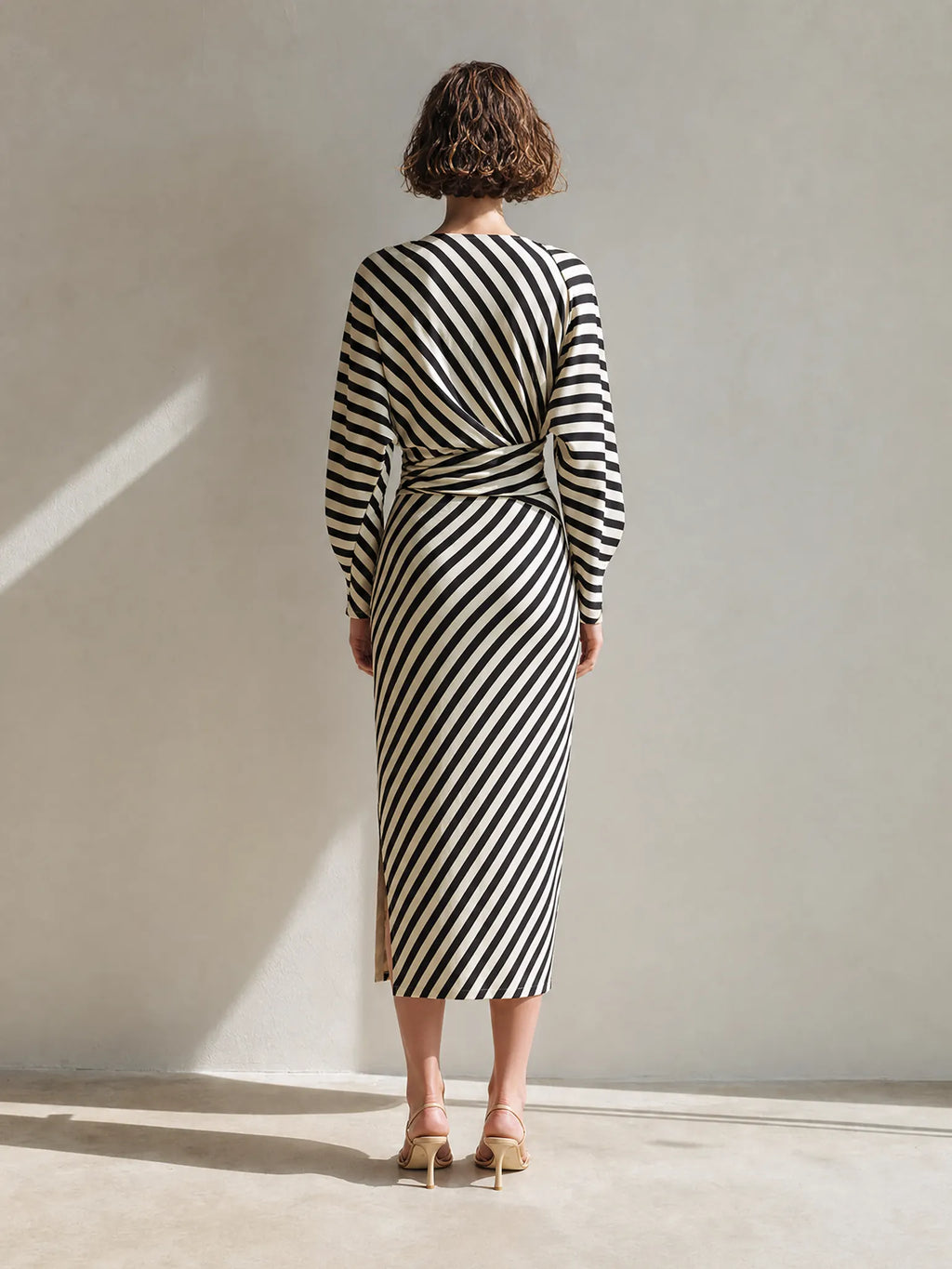 Women's Elegant Modern Black-and-White Striped Deep-V Twist-Front Bishop-Sleeve Slit Fitted Midi Dress MDZ1348G6CMX