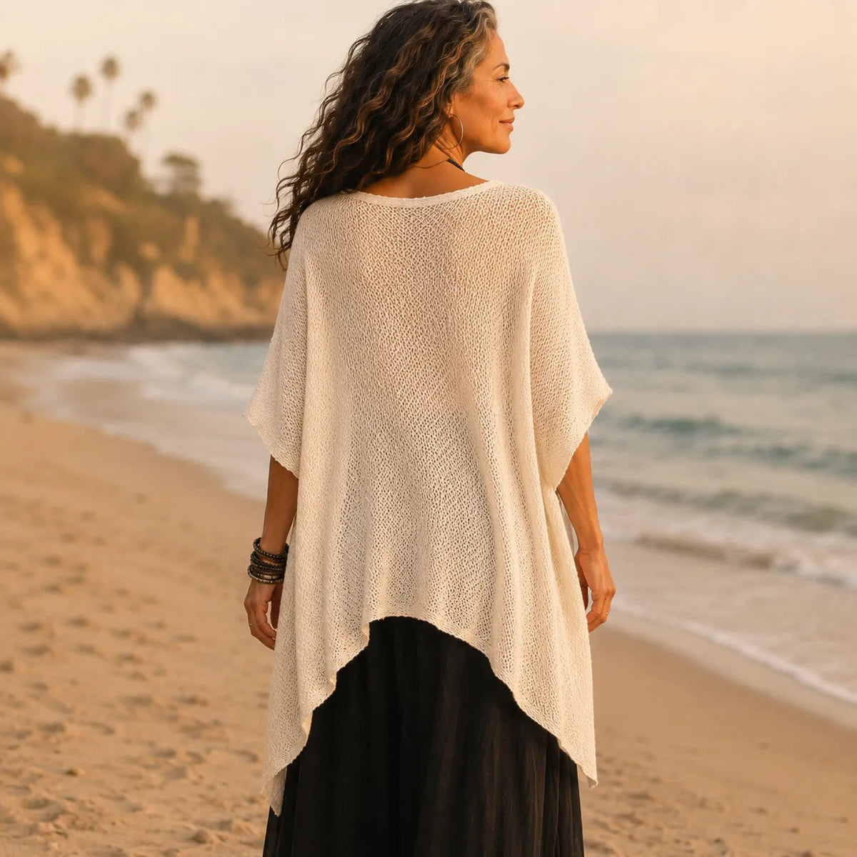 Solvera – Open Knit Batwing Top with Asymmetric Hem