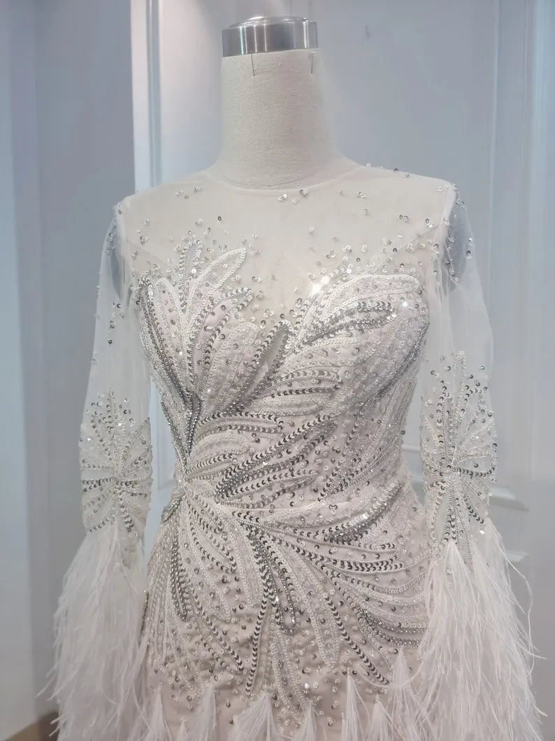 Custom Wedding Dress For Bride. Luxury short wedding dress with stones and feathers. Short wedding dress with elegant long sleeves.
