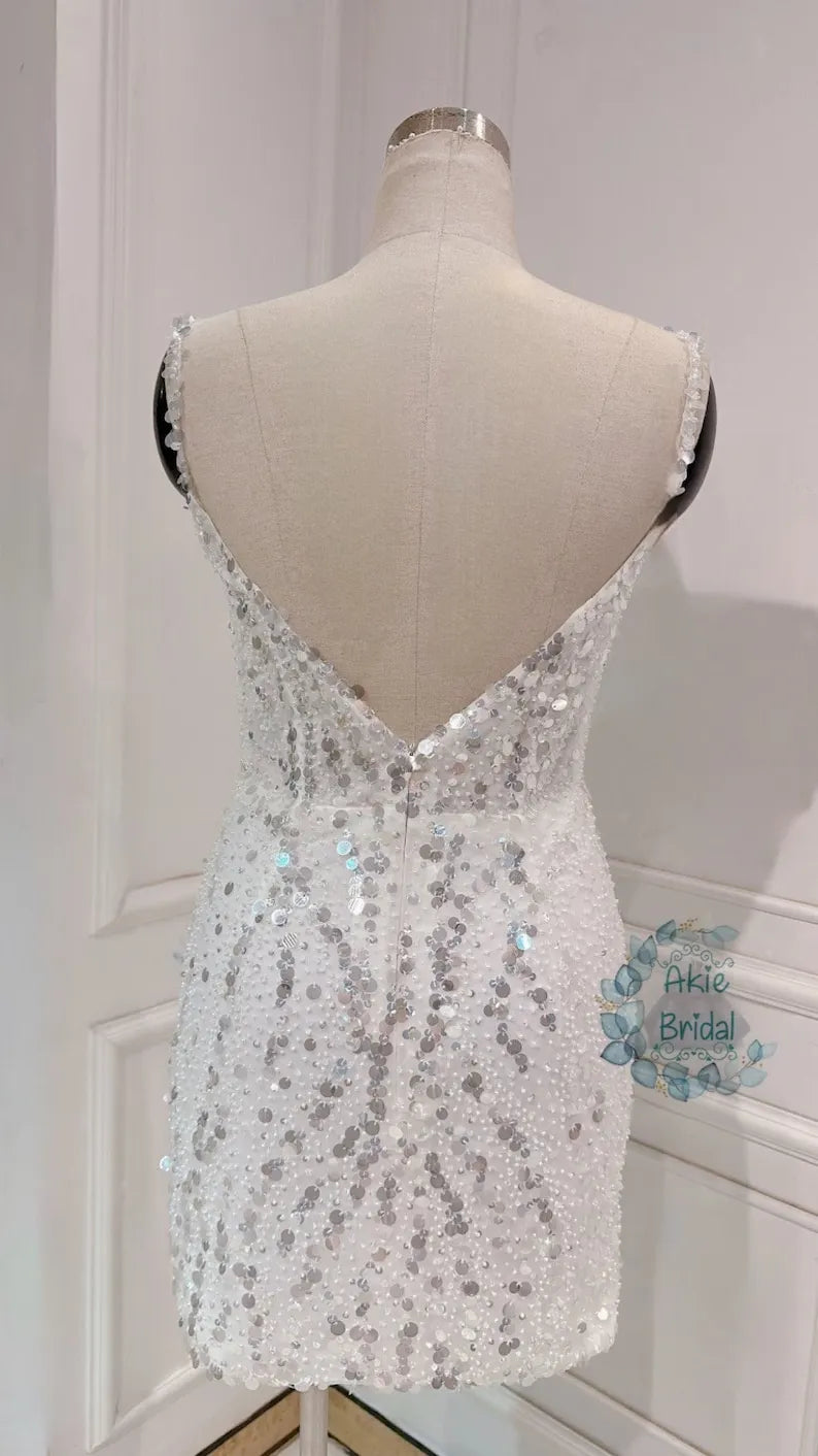 Custom wedding dress for the bride. Sexy V-deep short wedding dress. Beaded mini wedding dress with spaghetti sleeves for the party.