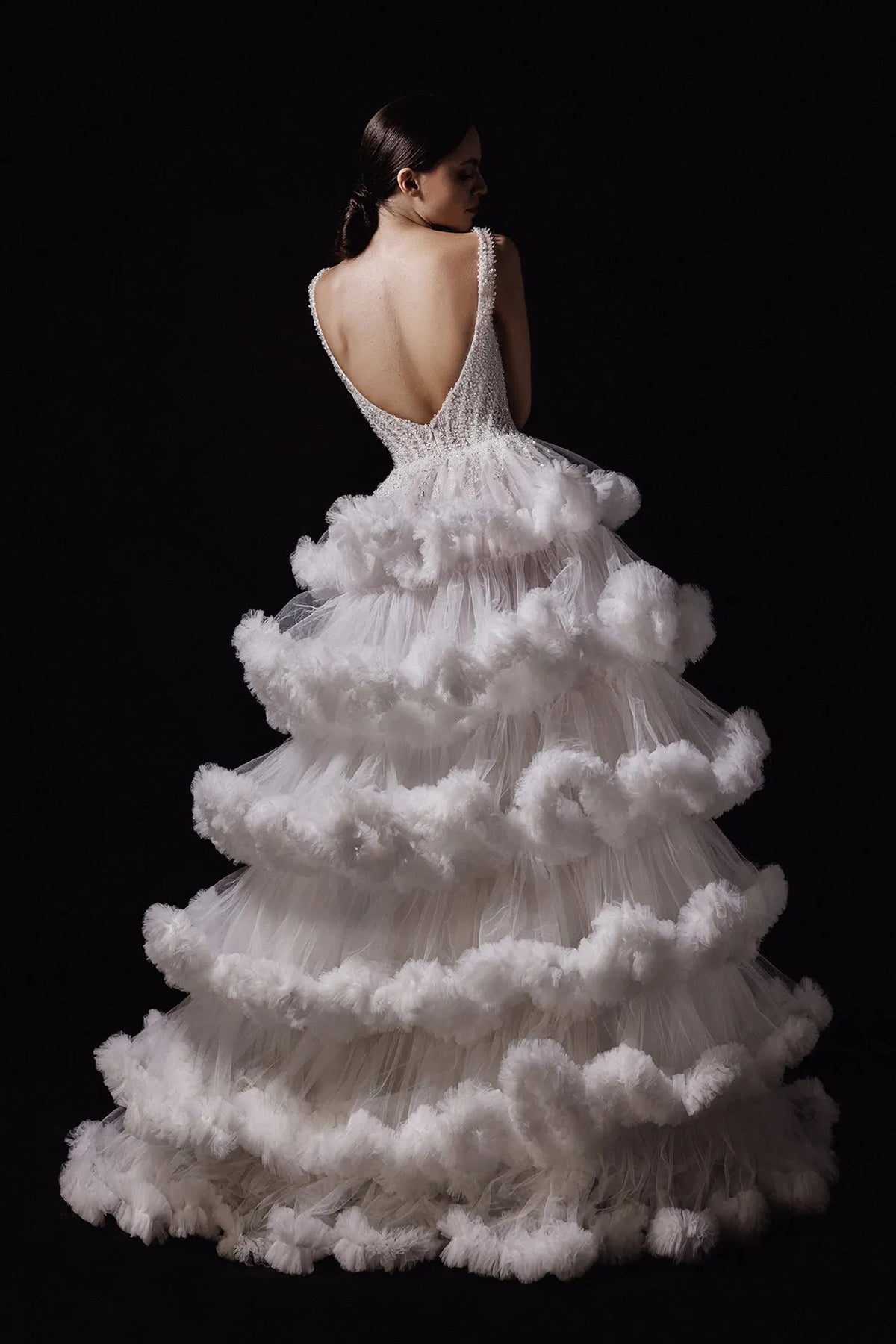Sleeveless wedding dress with fluffy tulle layers