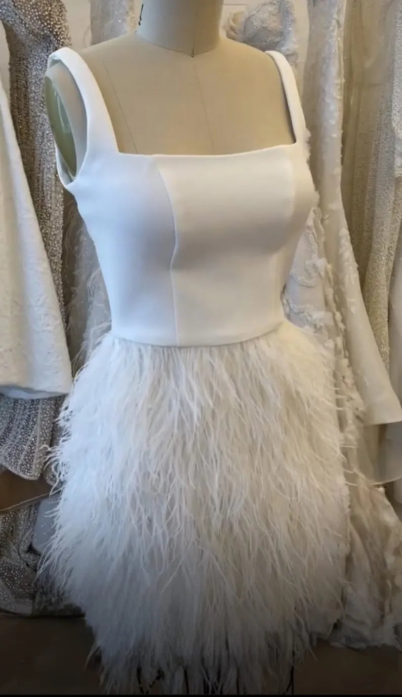 Custom short wedding dress for the bride.