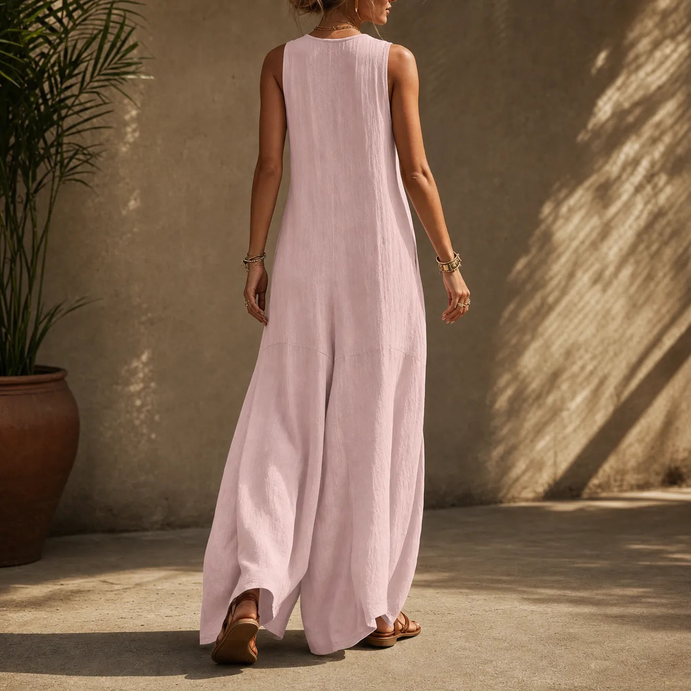 Wearvelle – Sleeveless Wide-Leg Jumpsuit with Diagonal Buttons and Pockets