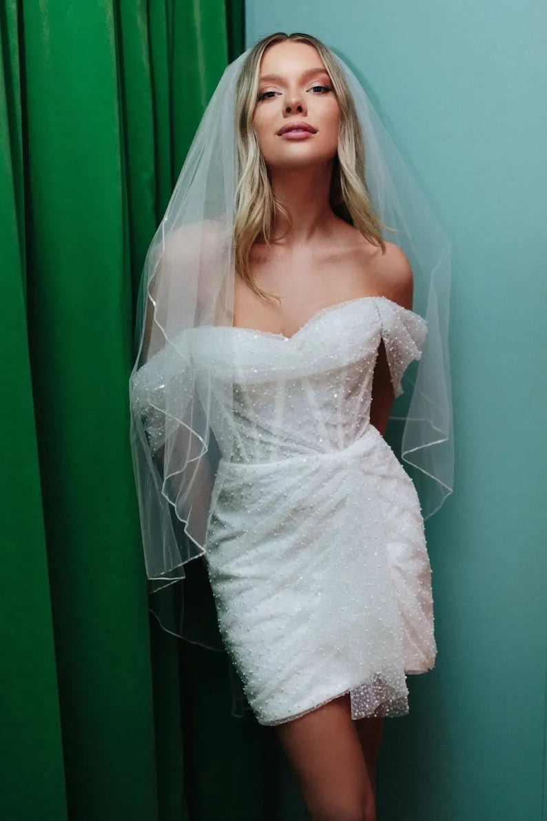 Elegant beaded off-the-shoulder short wedding dress. Sexy stylized pleated mini corset dress. Custom wedding dress, made to measure.