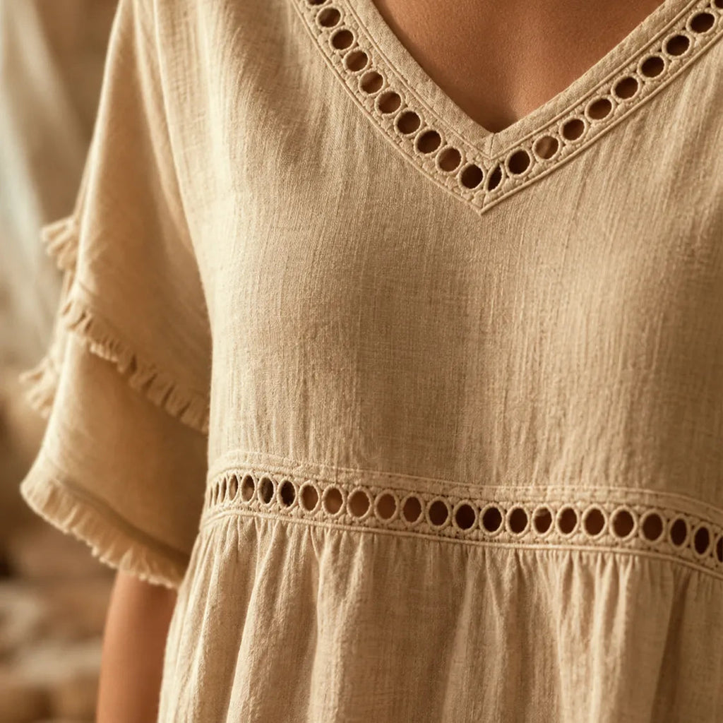 Meloria – Bohemian Babydoll Top with Eyelet Cutouts and Fringe Hem