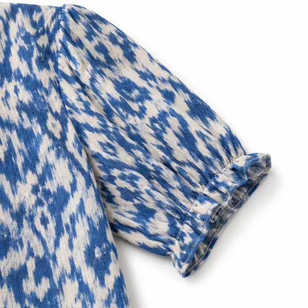 Solara – Ikat Print Boho Maxi Dress with Tassel V-Neck