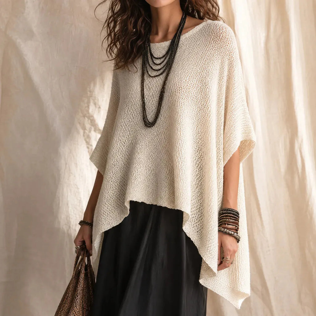 Solvera – Open Knit Batwing Top with Asymmetric Hem