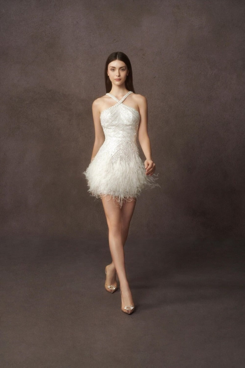 Custom short wedding dress for the bride. Mini wedding dress beaded and luxurious feathers.