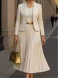 White pleated dress with suit jacket