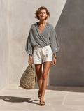 Women’s Black & White Striped Wrap Blouse & White High-Waisted Shorts Two-Piece Set MDZ2724D6T