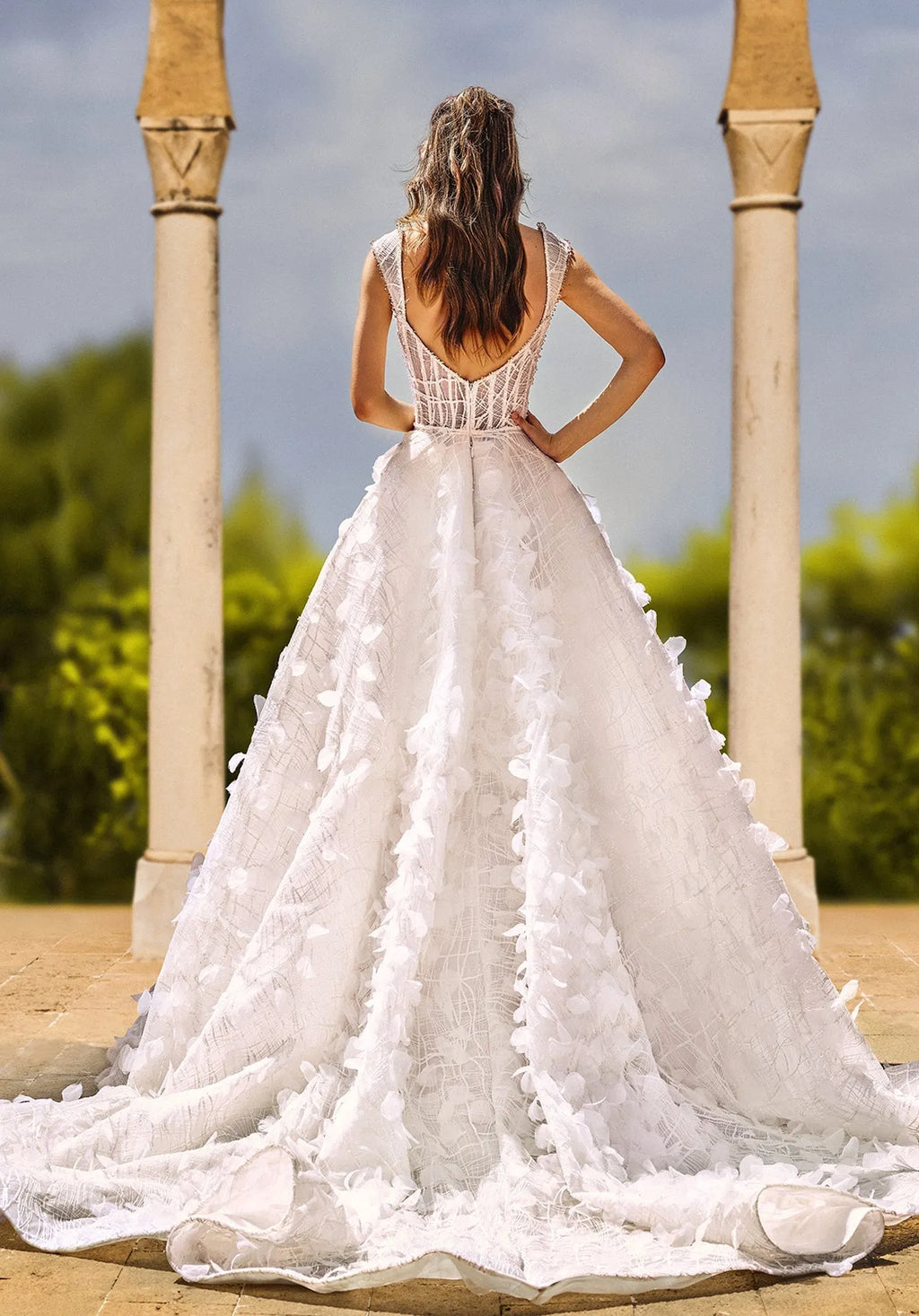 Sleeveless wedding dress with organza petals