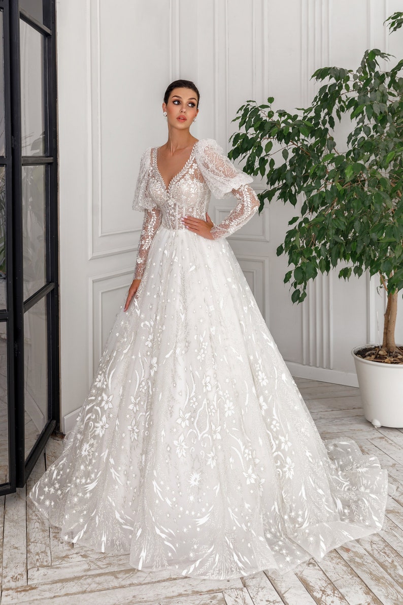 Designer Long Half puff sleeve V-neckline Corset Reflective glitter Sparkling Sequin handmade applications A-line princess wedding dress