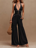 Black Cotton Halter Neck Contrast Embroidered Tiered Flared Jumpsuit
